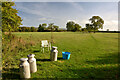 Milk Churns and a Chair by a Public Footpath, Henton, Somerset