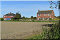 Houses on Burbage Road, seen from footpath across fields