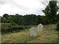 SO6562 : Headstones in the churchyard, Stoke Bliss by Jonathan Thacker