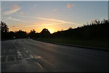 SP8263 : Sunset on the A4500, Ecton by David Howard