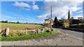 Signs by the entrance to Lea village hall