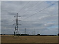 Stubble field and pylons