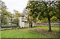 Wall, railings and monument at Belton Park