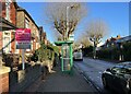 House for sale and bus shelter