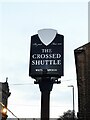 Sign for the Crossed Shuttle pub