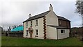 NY4857 : Farmhouse at Greenholme on north side of A69 by Roger Templeman