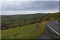 SJ9779 : Bakestonedale Road approaching Charles Head by Christopher Hilton