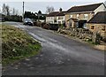 Houses opposite a grass triangle, Milbury Heath, South Gloucestershire