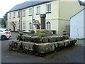 Cross stump outside All Saints church