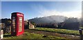 Public Telephone Box with Fog Covered Bright