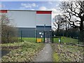 Security turnstile and fencing on industrial estate