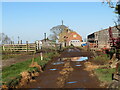 Track into Cote House farmyard