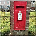 Cut mark lower left of post box Pembrey