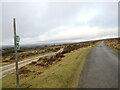 Llwybr yn gadael yr heol / Path exits the road