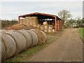 Straw bales by a farm track