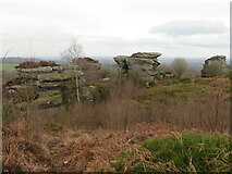 SE2165 : Gritstone outcrops at Hare Heads by Gordon Hatton