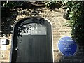 Blue plaque and entrance to Peel Cottage