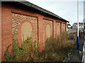 NS4757 : Ivy growing on the old goods shed by Richard Sutcliffe