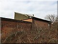 SU4964 : Damaged roof on disused building by Oscar Taylor