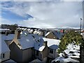 Across the rooftops