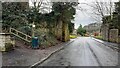 View along Station Road where it passes the remains of railway bridge