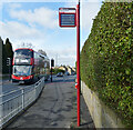 36 bus approaching a bus stop, Harrogate Road (A61), Harewood