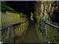 Footpath by railway at night