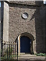 A clock above the door