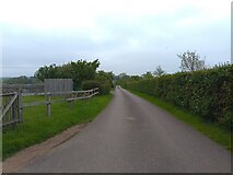 SP3506 : Road by Barleypark Farm Cottages by Oscar Taylor