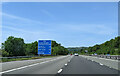 On the M4 heading west, with sign showing distances