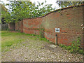 Serpentine wall surrounding the garden at Dunwich