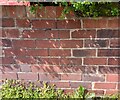 Benchmark cut into roadside wall, Grove Lane, Meanwood Leeds