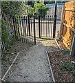 Kissing gate across a path, Stonehouse, Gloucestershire