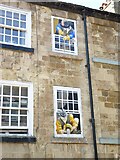 SE3457 : Water Bag Bank, Knaresborough window murals by Jeff Gogarty