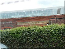 SJ2671 : Brickwork on wall of former paper mill by David Smith