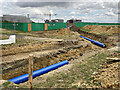 TL4555 : Pipes for Cambridge South Station by John Sutton