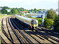 Down train approaching Mount Pleasant Road level crossing, Southampton