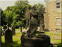 SE1017 : Angel reading on a memorial monument, Lindley by Humphrey Bolton