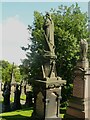 Mourner with anchor, Batley Cemetery