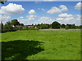 Melchbourne, grass field and village