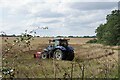 Mowing a Field Near Rice Bridge