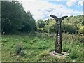 SK5956 : Millennium milepost by Boundary Wood by David Lally