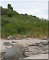 A ruined lookout tower seen from Silver Sands, Kildonan, Arran