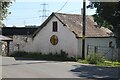 Old AA village sign on farm building, Hundleton