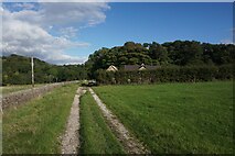SJ9684 : Farm track passing Elmerhurst Cottage by Bill Boaden