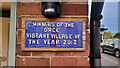 Vibrant village of the year plaque