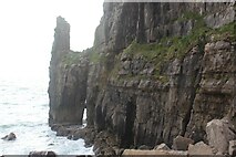 SR9692 : Coastal limestone pinnacle and arch by M J Roscoe