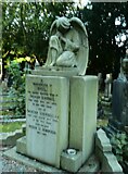 SE2639 : Crouched angel, sleeping, Lawnswood Cemetery by Humphrey Bolton