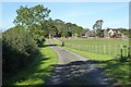 Track approaching cottages