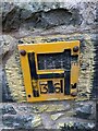 SH7956 : Damaged hydrant marker on visitor centre, Betws-y-Coed by Meirion